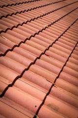 brown tile roof weathered on building residential