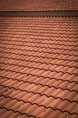 brown tile roof weathered on building residential