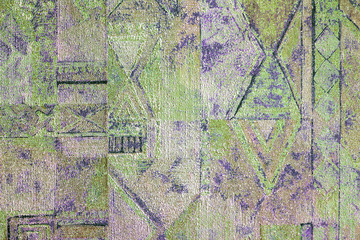 the heterogeneous texture of the paper on the wall