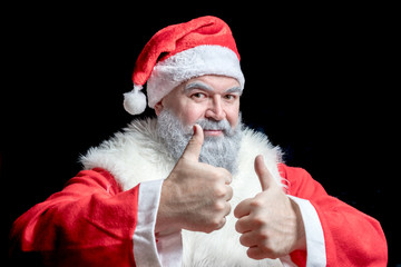 Santa Claus picked up two thumbs up