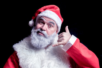 Santa Claus is on the phone to congratulate the new year