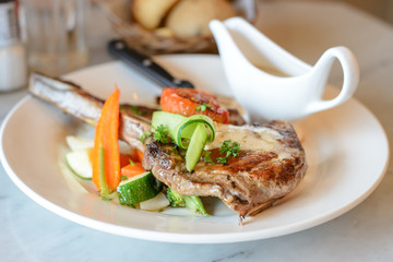 Pork chop steak and vegetable salad