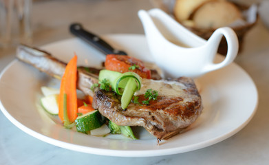 Pork chop steak and vegetable salad