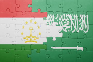 puzzle with the national flag of saudi arabia and tajikistan