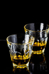 Two glasses of whiskey