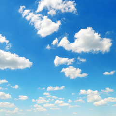 cumulus clouds in the blue sky