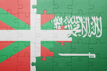puzzle with the national flag of saudi arabia and basque country