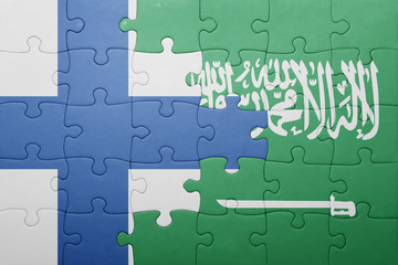 puzzle with the national flag of saudi arabia and finland