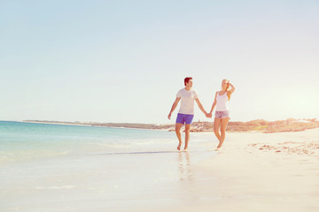 Romantic young couple on the beach