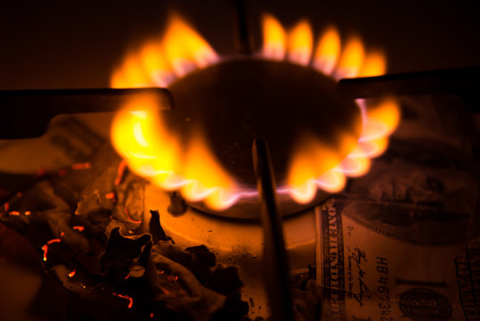 Gas stove. Dollars on a gas cooker