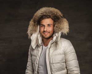 A man in winter jacket.