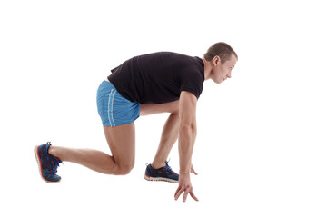 Side view of runner on starting block