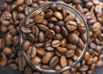 Naklejka premium brown coffee, background texture, close-up