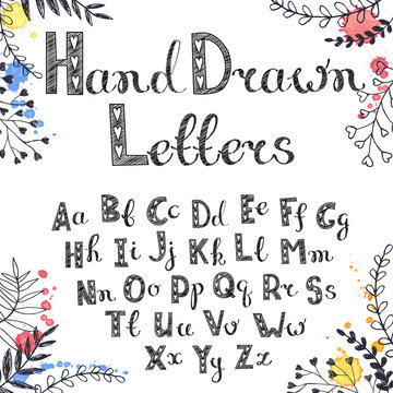 Vector hand drawn letters. English alphabet white on black. Doodle letters drawn on chalkboard.