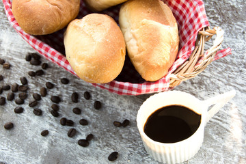 bread and coffee on wooden