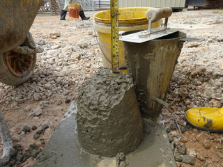 The slump test equipment. Wet concrete was compacted for the slump test. 