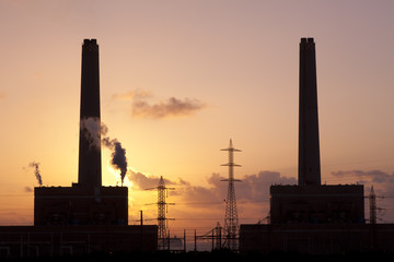 Fototapeta na wymiar Power Plant At Sunset