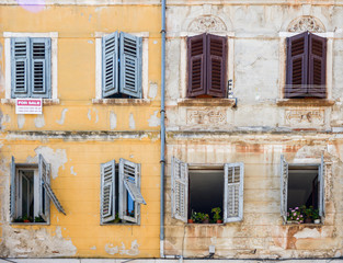 Fototapeta na wymiar Windows and walls in old town Rovinj Croatia