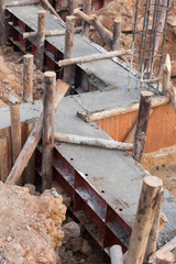 Fototapeta na wymiar pillar and beam being constructed at construction site