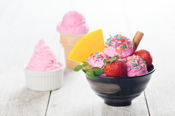 Pink ice cream with strawberry fruits