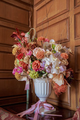 Bouquet of flowers in stone vase