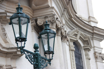 Lantern on the background of a historic building in Prague