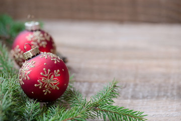 Fototapeta na wymiar red Christmas ornament balls, fir tree decoration