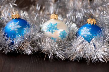 Christmas ornament balls on the wooden background