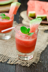 Watermelon drink in glasses with slices of watermelon