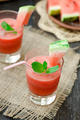 Watermelon drink in glasses with slices of watermelon