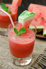 Watermelon drink in glasses with slices of watermelon