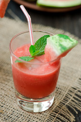 Watermelon drink in glasses with slices of watermelon