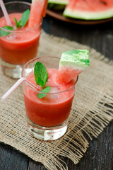 Watermelon drink in glasses with slices of watermelon