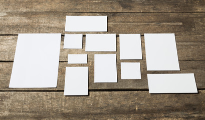 Fototapeta premium Blank stationery set on wood background 
