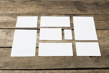 Blank stationery set on wood background