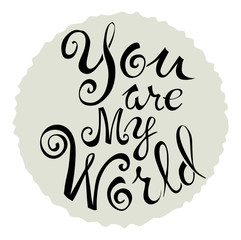 Text of You are my world, on a gray circle