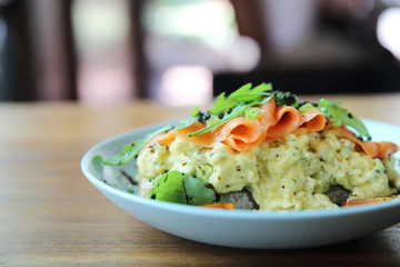 Scrambled eggs with smoked salmon and avocado