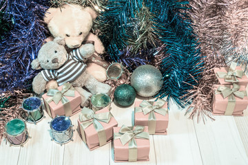 decorate Christmas and little bear on the wood floor