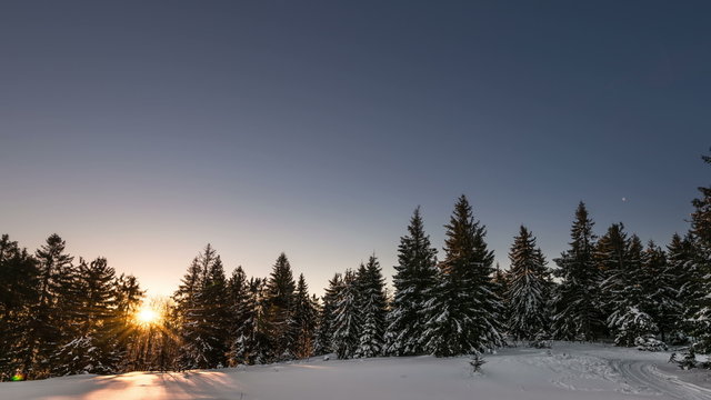 Aurora time lapse in winter mountain