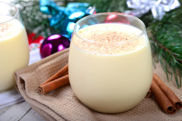 Glass of eggnog in a Christmas setting