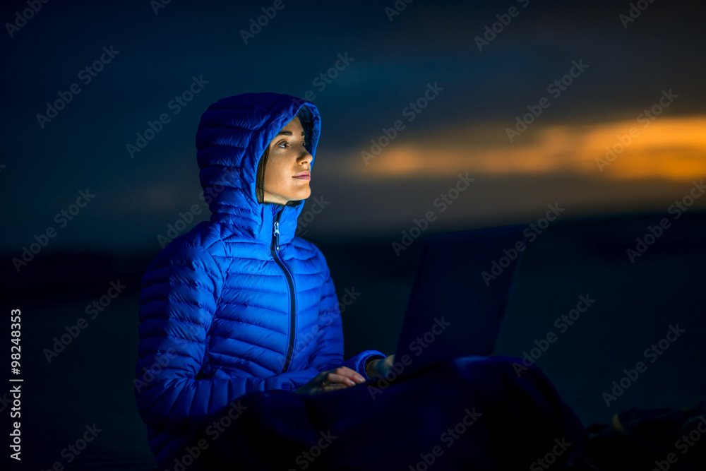 Wall mural photographer working outside in the early morning