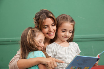 kindergarten class reading a book