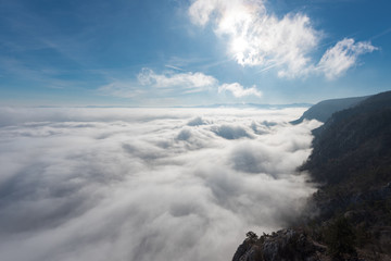 über den Wolken - Aerial view of the sky and fog a from a plateau on a mountain.