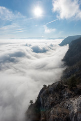 über den Wolken - Aerial view of the sky and fog a from a plateau on a mountain.