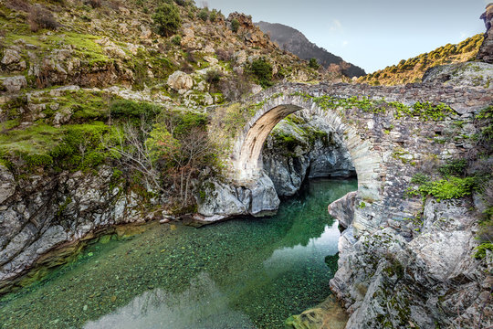River passing through Genoese bridge at Asco in Corsica