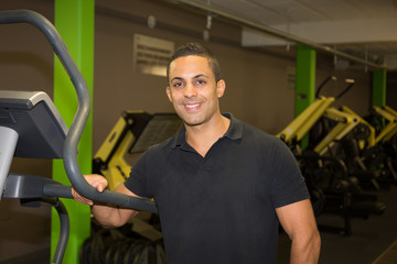 Personal trainer working out in a fitness center