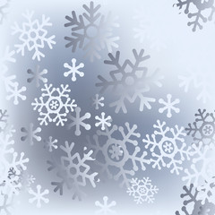 Christmas seamless pattern of big and light small snowflakes.