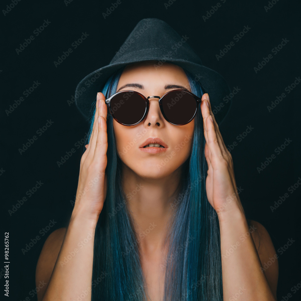 Wall mural fashion girl in sunglasses