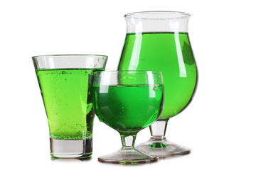 Glass cup with tequila on white background