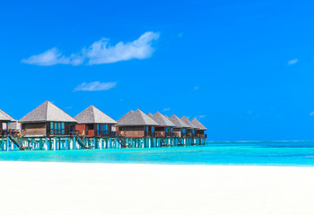  beach with water bungalows Maldives